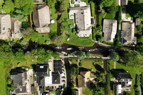 Boats sailing on the canals of Giethoorn Village